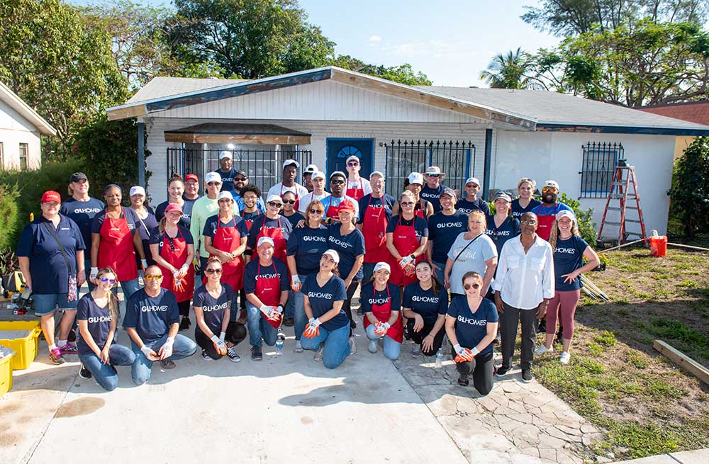 The GL Homes team volunteers to clean up home in Delray Beach.