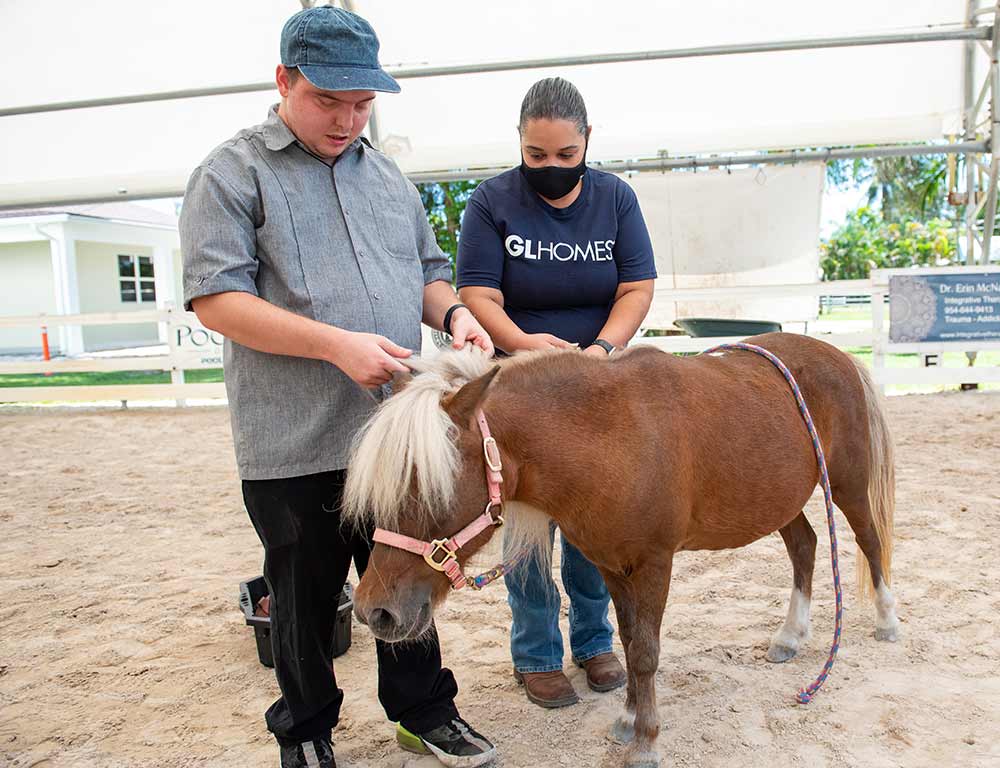 GL Homes and equine therapy with Legal Aid Society