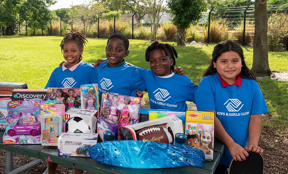 Boys & Girls Clubs of Palm Beach County with holiday gifts from GL Homes