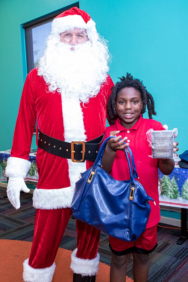 GL Homes plays Santa Claus with Boys & Girls Clubs of Lee County members. 