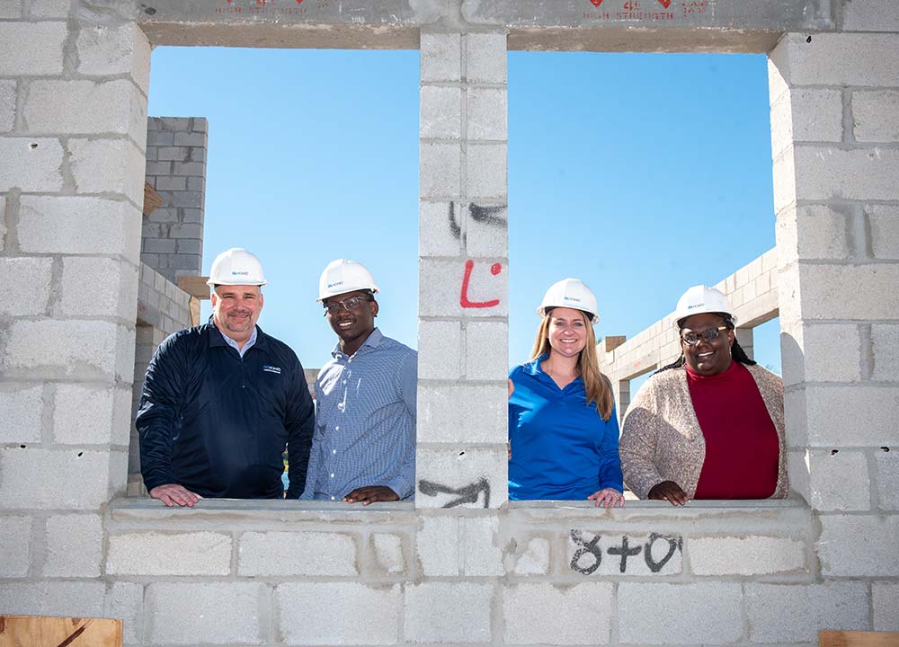 GL Homes tours a construction site with Youth of the Year Finalists.