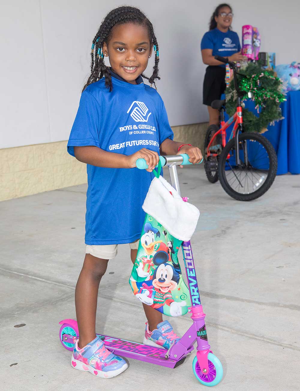 GL Homes donates gifts to Boys & Girls Club of Collier County.