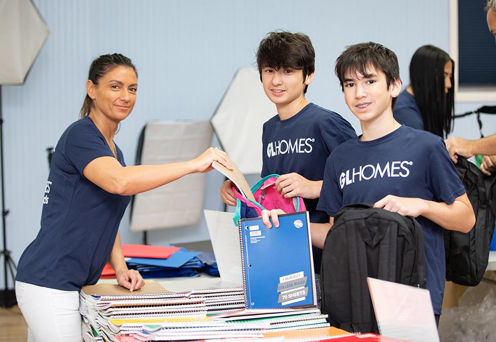 GL Homes employees and their children volunteer at the Boys & Girls Clubs of Palm Beach County Back to School Drive.