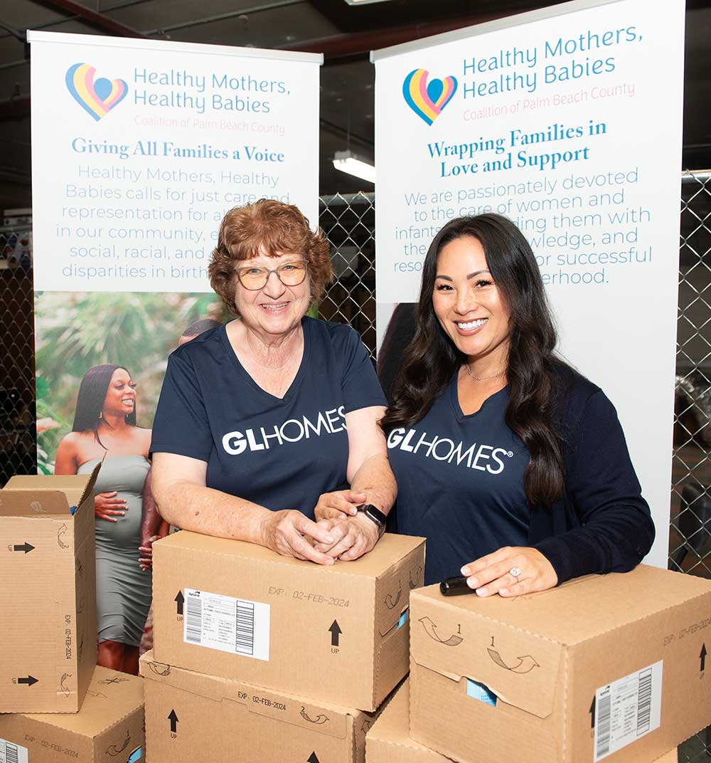 GL Homes volunteers in helping mothers and babies at event in Boca Raton, Florida.