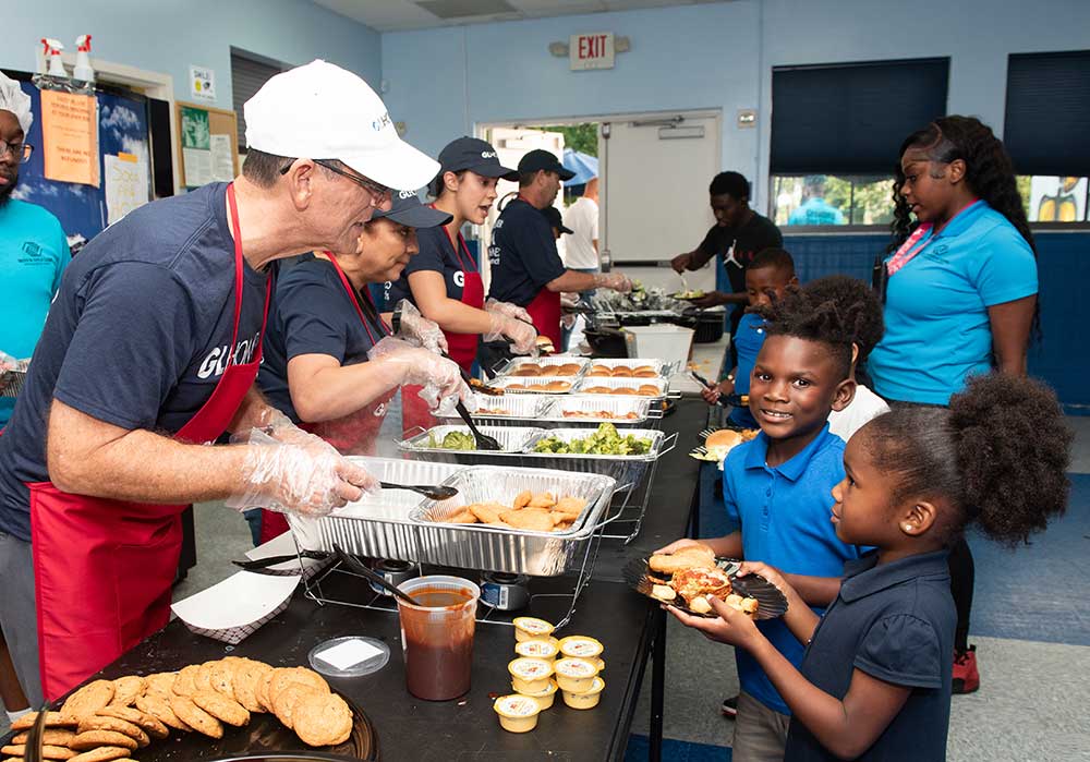 GL Homes volunteers to help feed children in West Palm Beach, Florida.