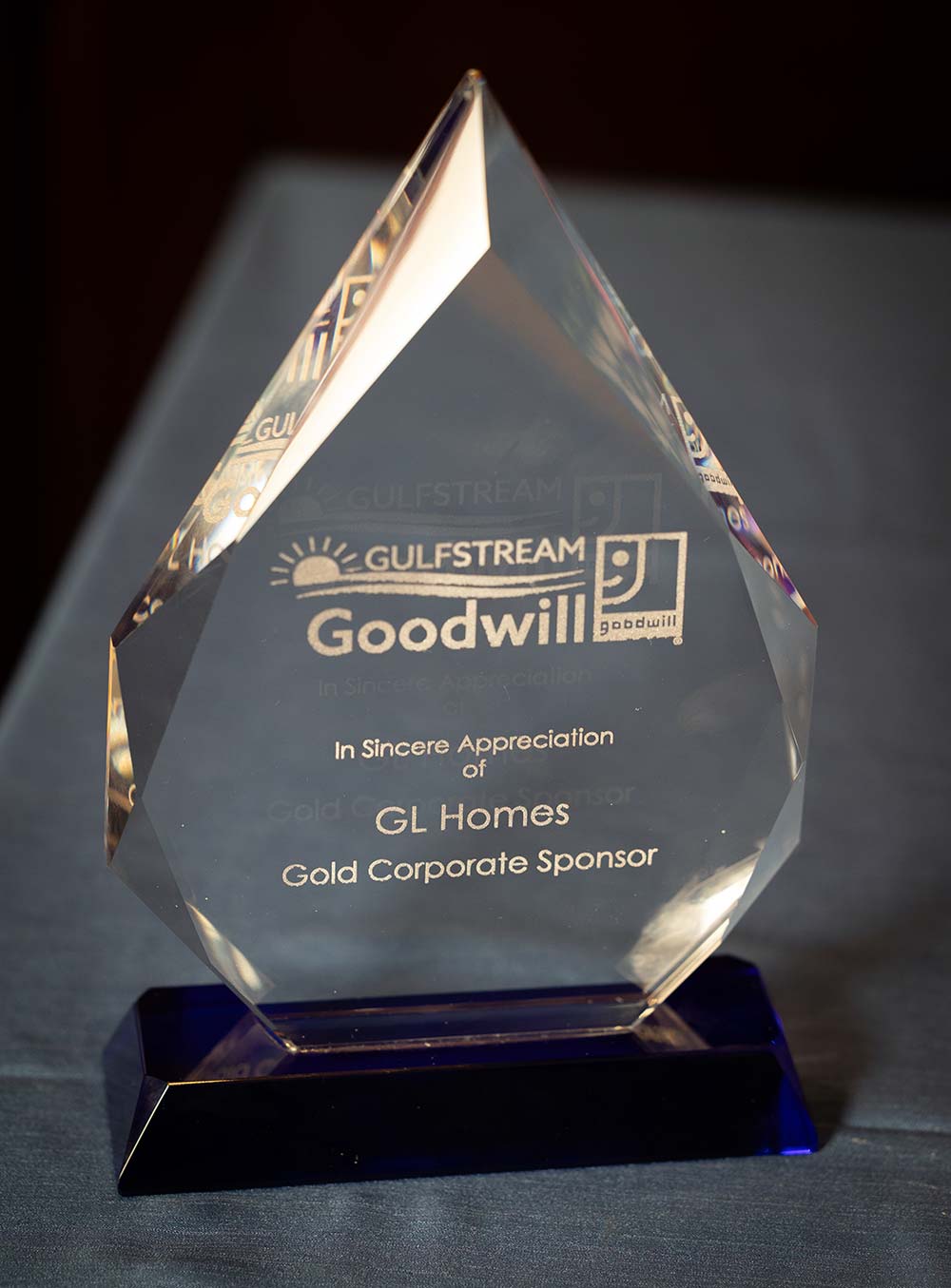 GL Homes receives Goodwill's Gold Award at festive holiday party.