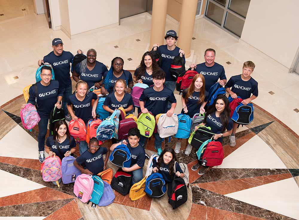 The GL Homes team packs school supplies for Boys & Girls Clubs of Palm Beach County School Supplies Drive.