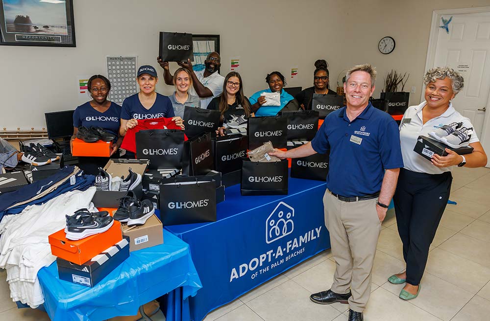 The volunteer team of GL Homes supporting Adopt-A-Family of the Palm Beaches.